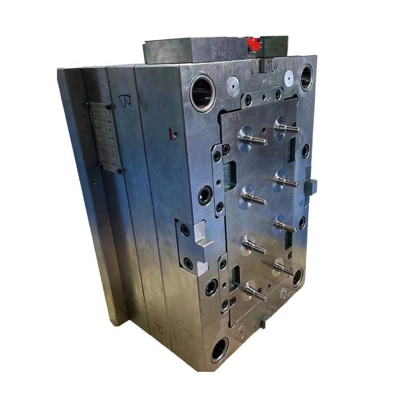 Single machined steel mold plate (mold base) resting on the toolroom bench