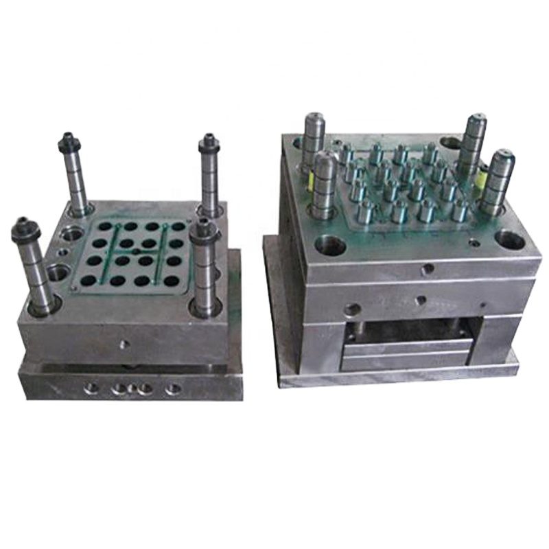 Multi-cavity forming die with rows of identical cavities and a second mold half beside it
